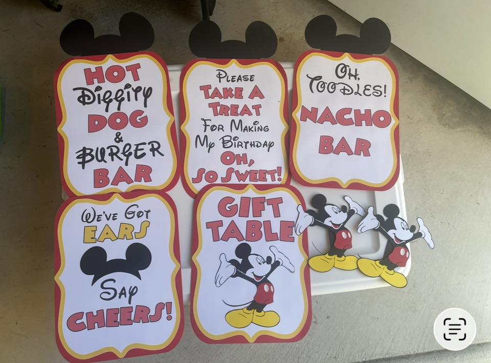 Set of Mickey Mouse-themed party signs for food, gift, and treat tables.