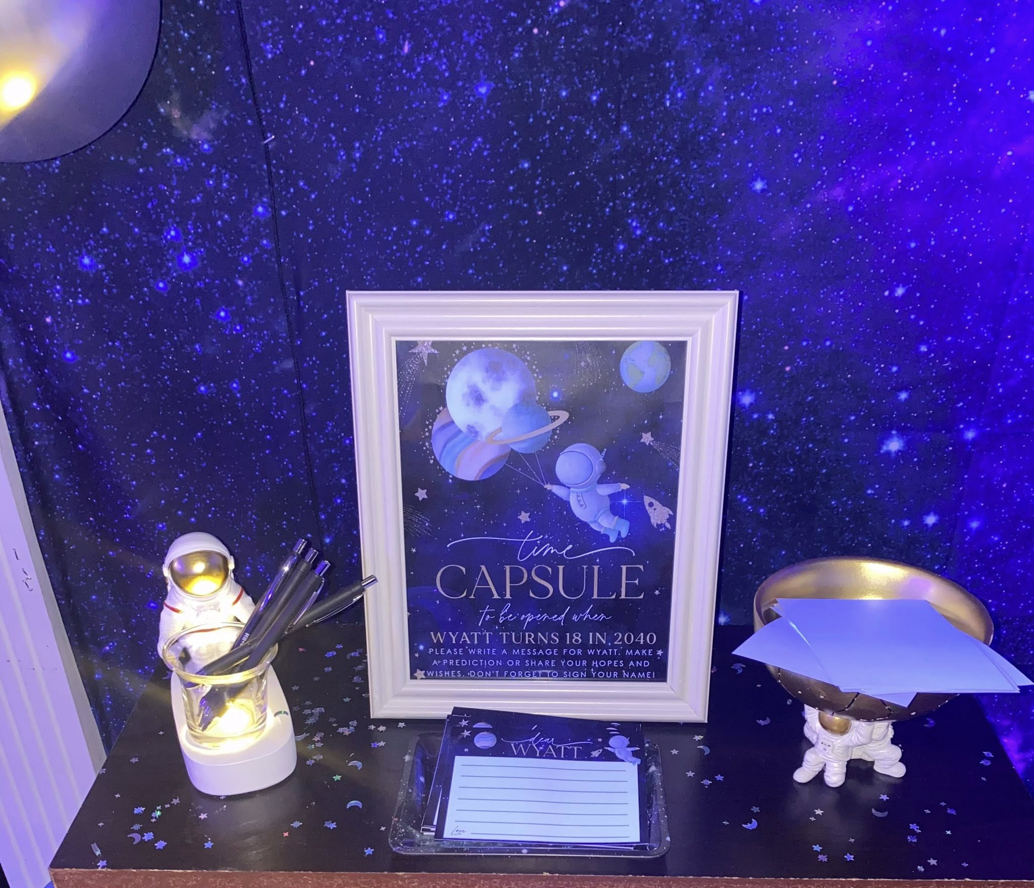Space-themed time capsule guest book sign and stationery for Wyatt's birthday event