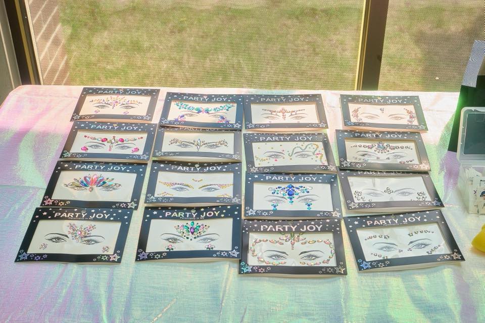 Collection of various Party Joy designs for temporary crystal face jewelry and eye gem stickers.