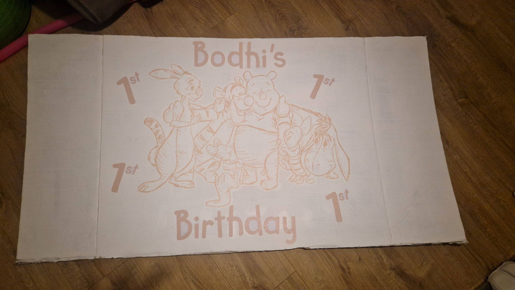 Custom Winnie the Pooh graphic for Bodhi's 1st birthday party sign