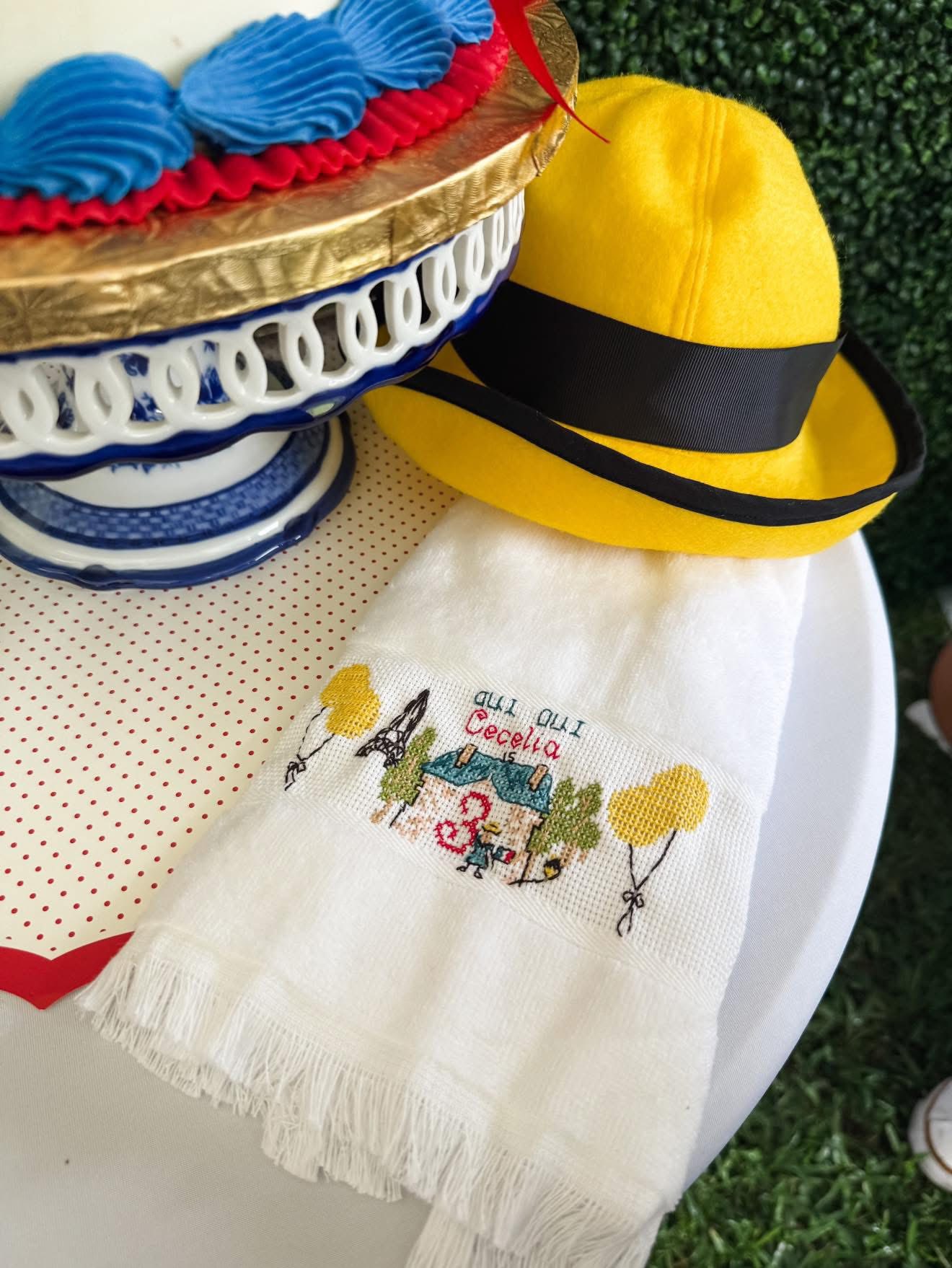 Custom embroidered towel with French-themed party design and text reading Oui Oui Cecelia is 3.