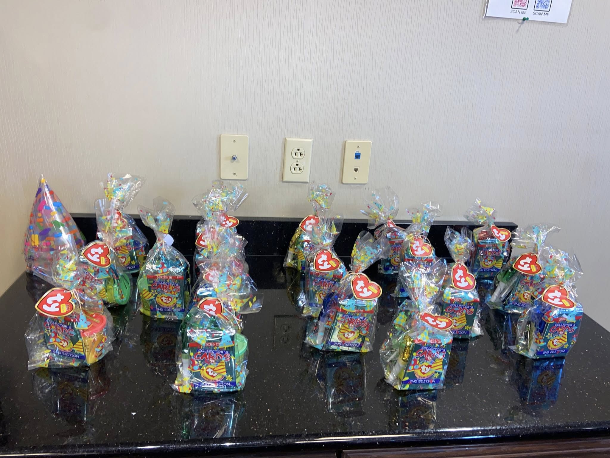 Row of Ty Collector's Cards 2nd Edition favor bags wrapped in cellophane