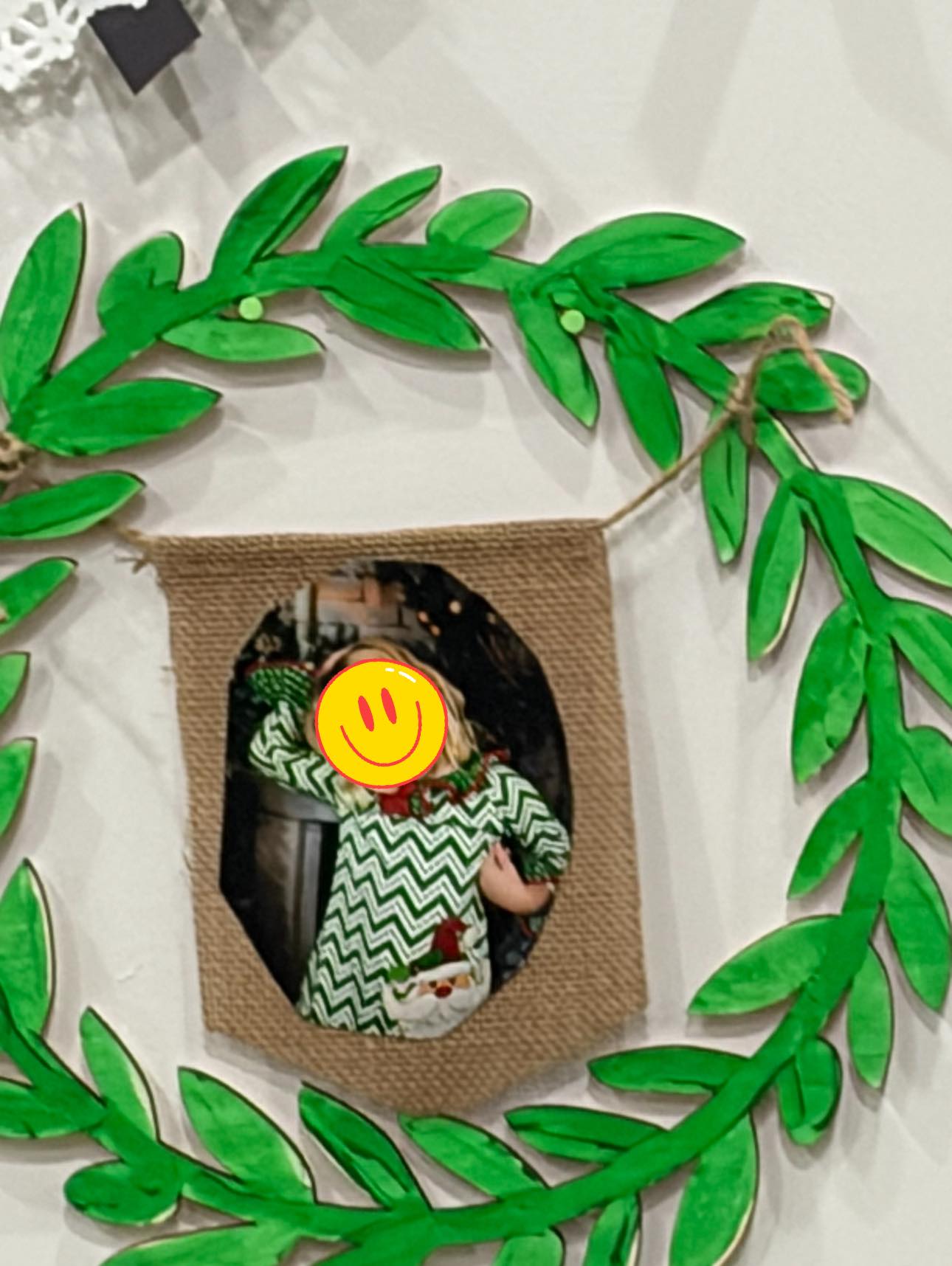 Wooden green leaf wreath with hanging burlap photo frame