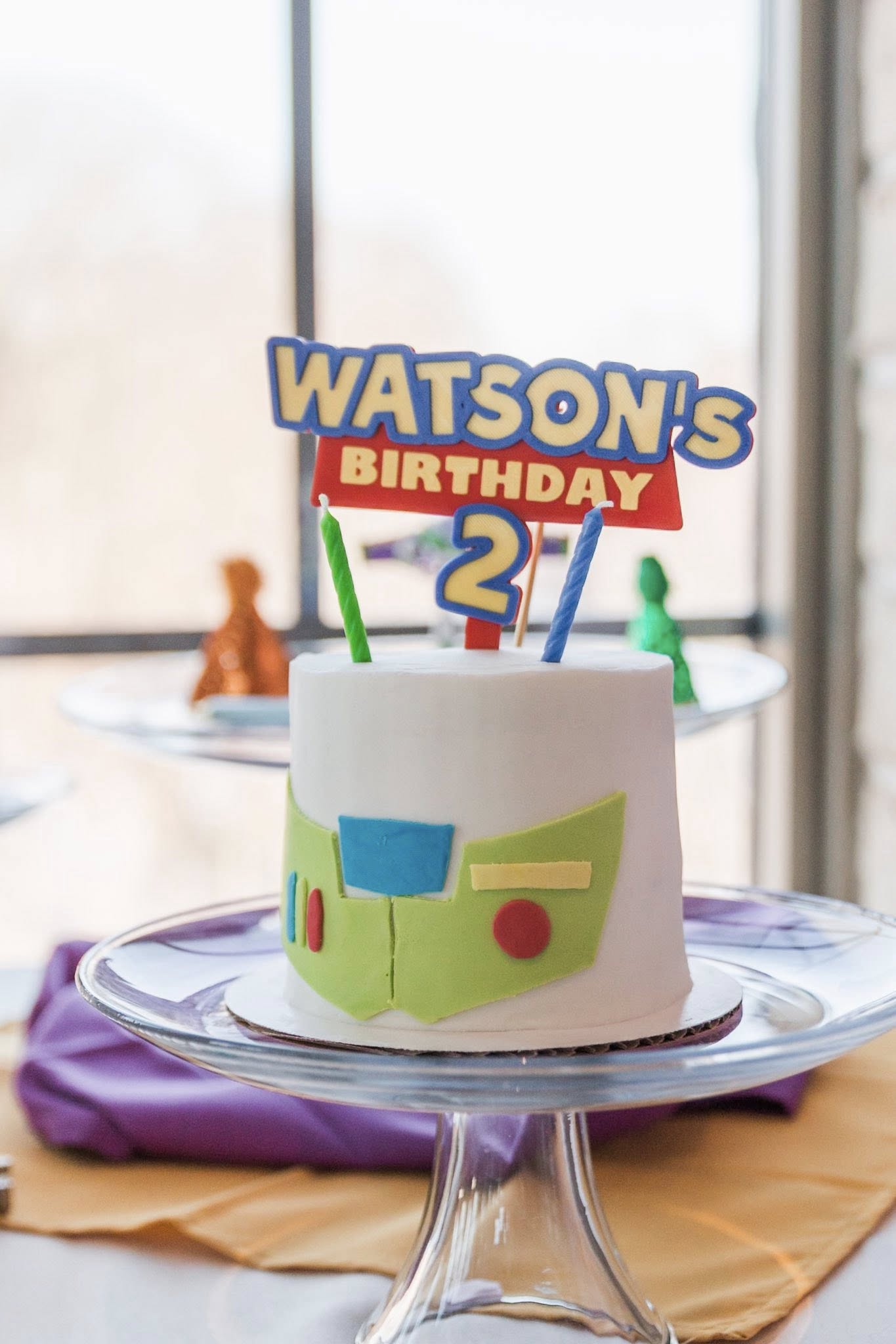 Buzz Lightyear themed birthday cake with a personalized Watson's 2nd birthday cake topper.