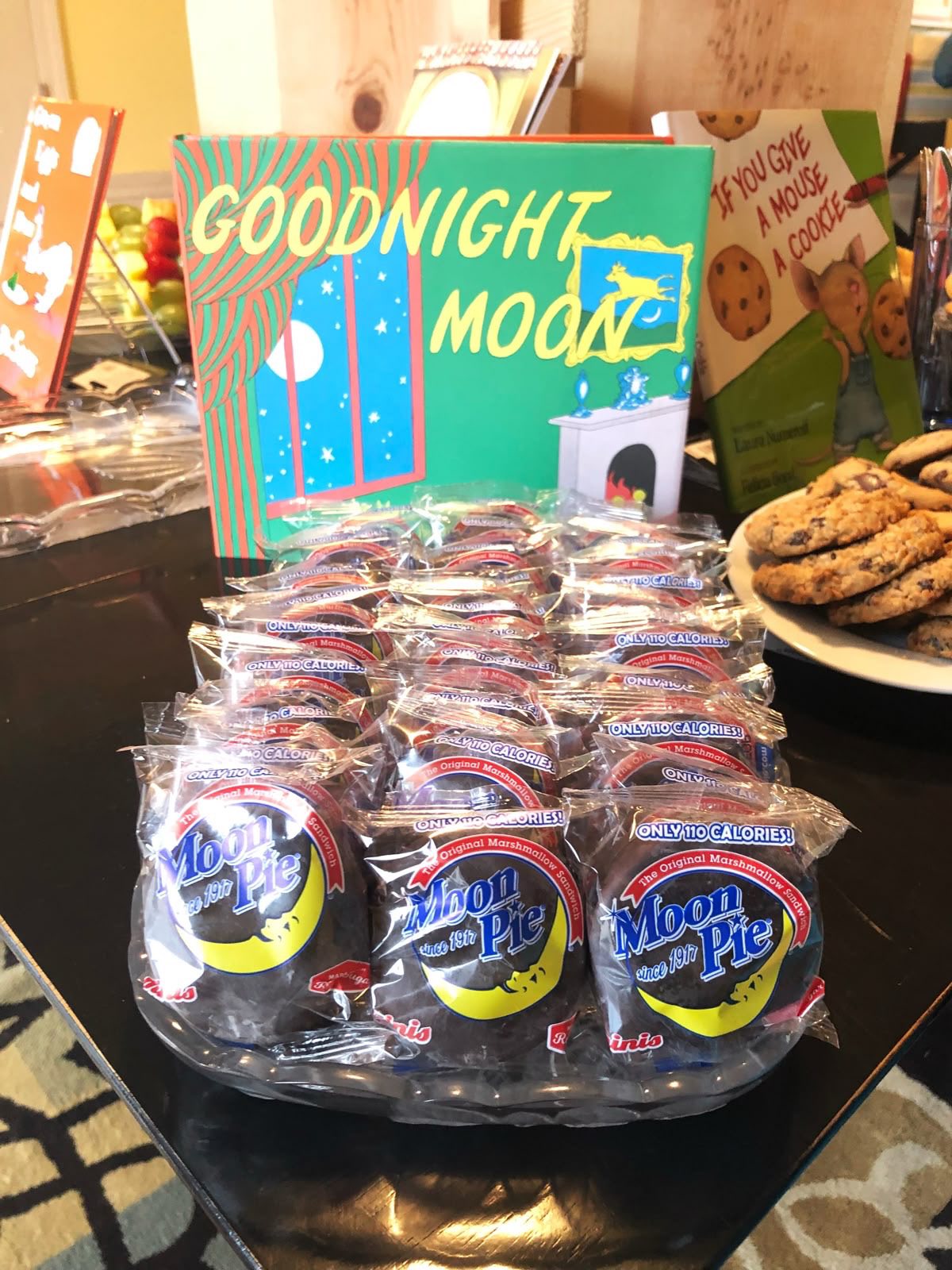 Table display featuring a box of Goodnight Moon and multiple single-serve packs of Moon Pies
