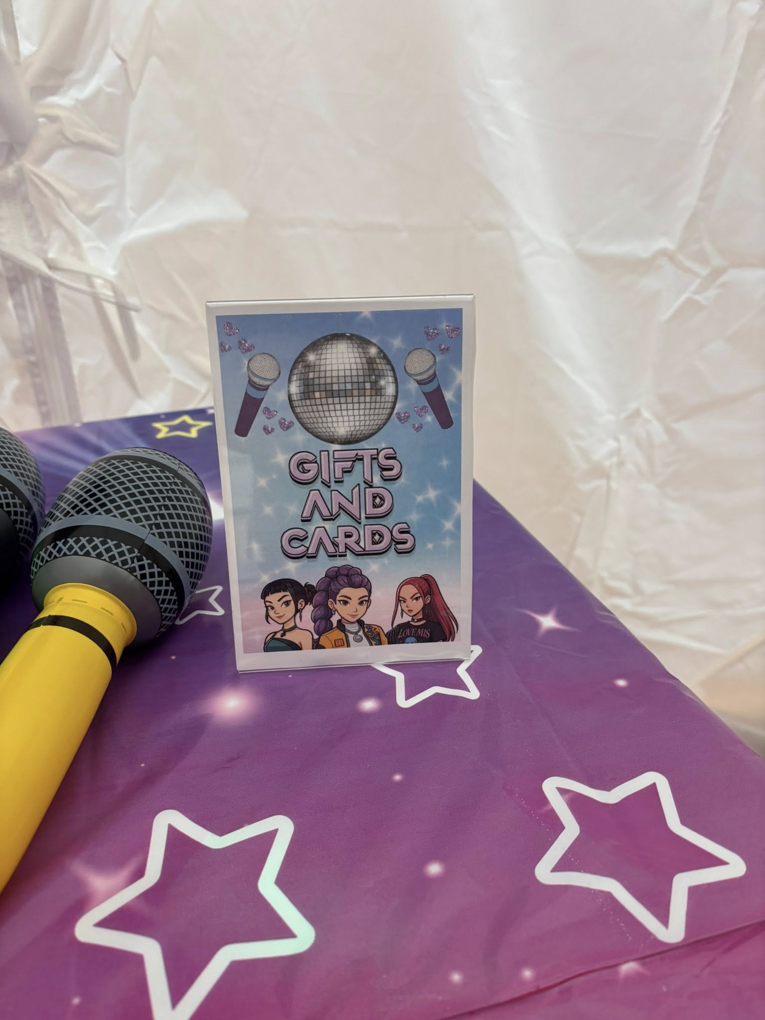 Tabletop sign for a party gifts and cards station featuring a disco theme