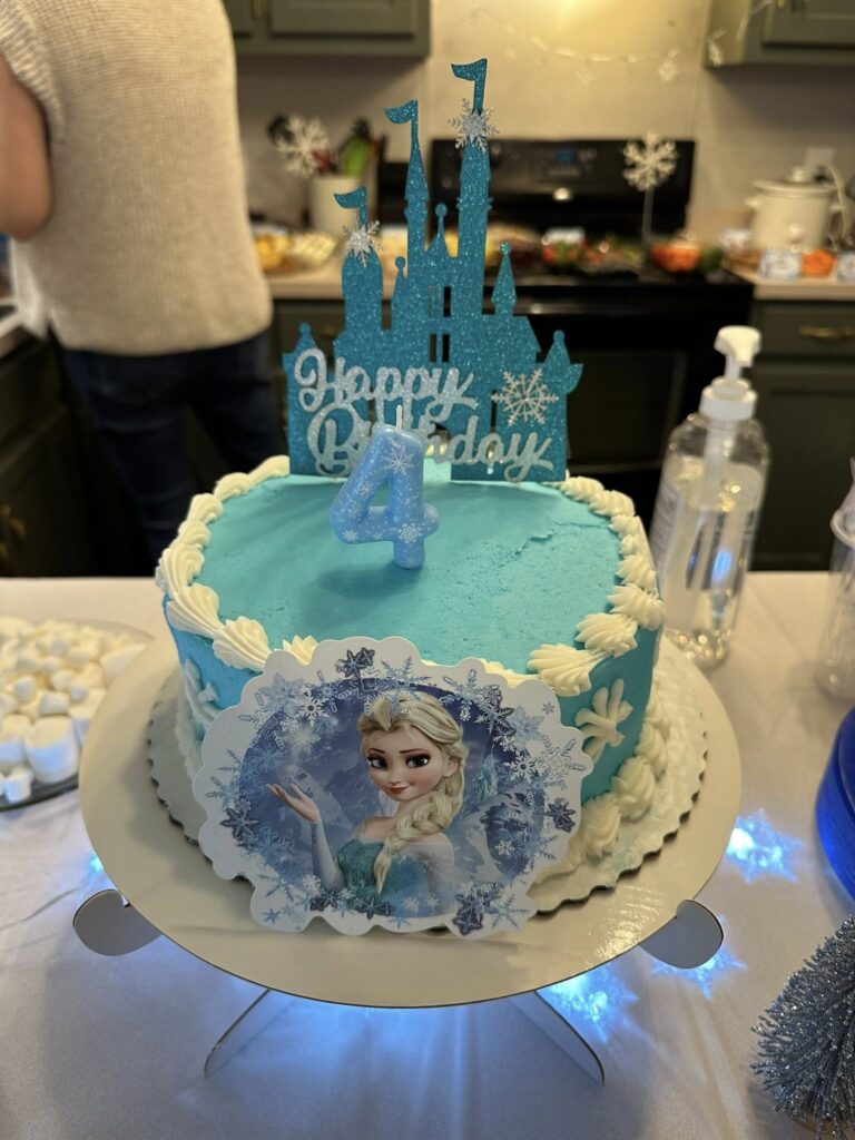 Four the first time in Forever Frozen birthday party