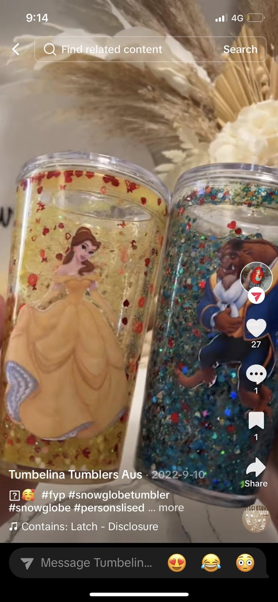 Two clear snow globe tumblers featuring Belle and the Beast with glitter accents.