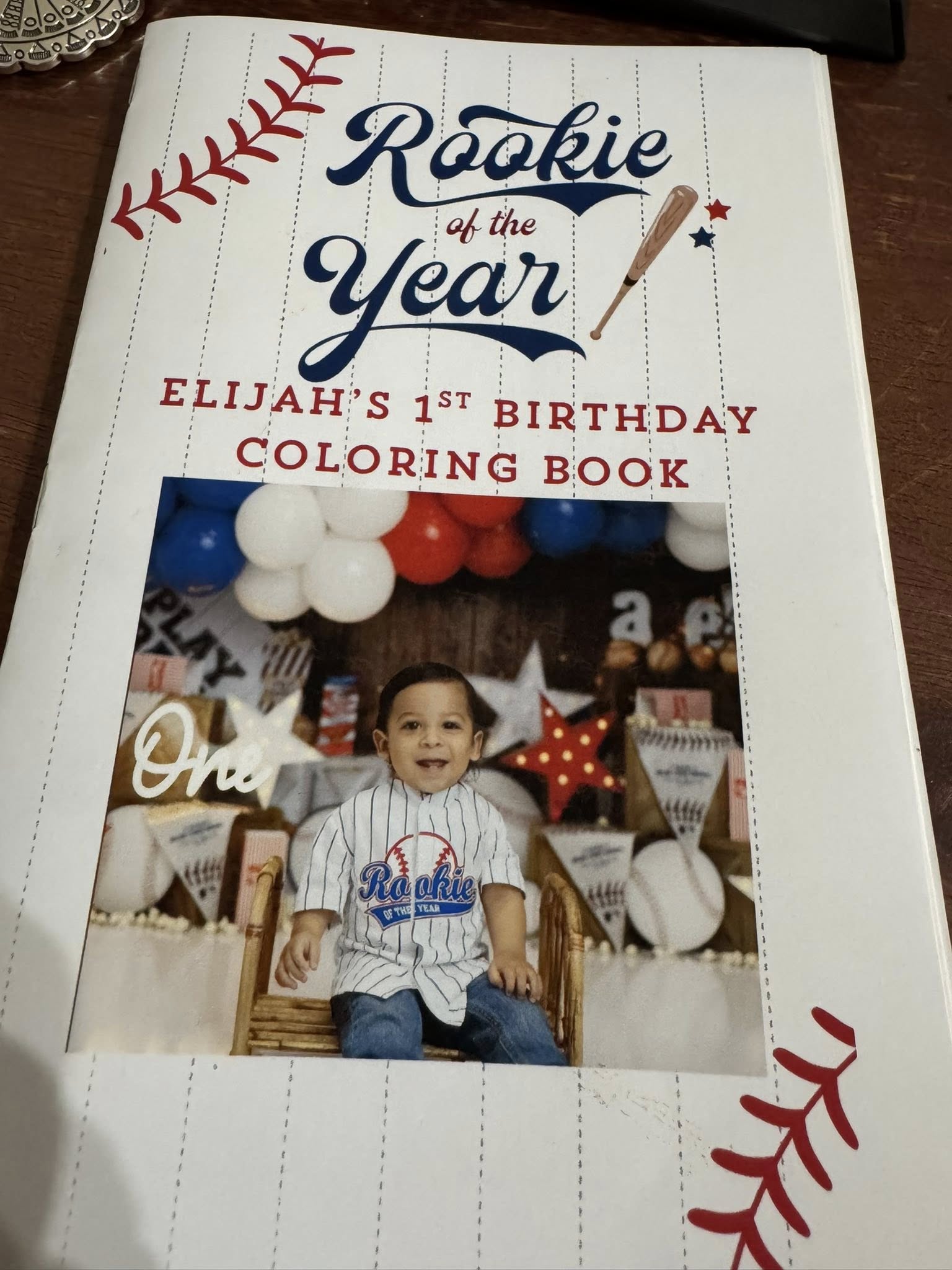 Custom Rookie of the Year themed birthday coloring book cover featuring a photo of a toddler.