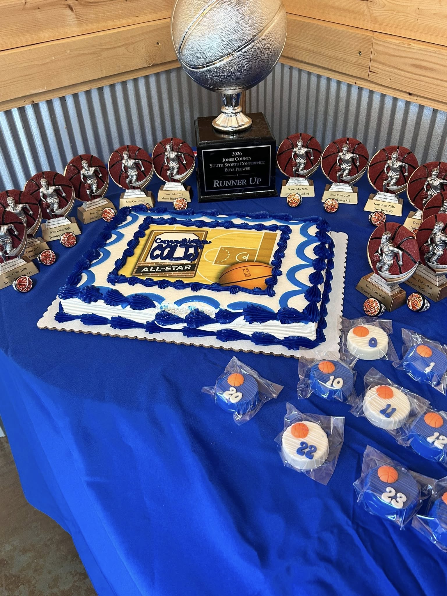 Basketball themed cake for the Soso Colts All-Star team runner up banquet with trophy and player cookies.