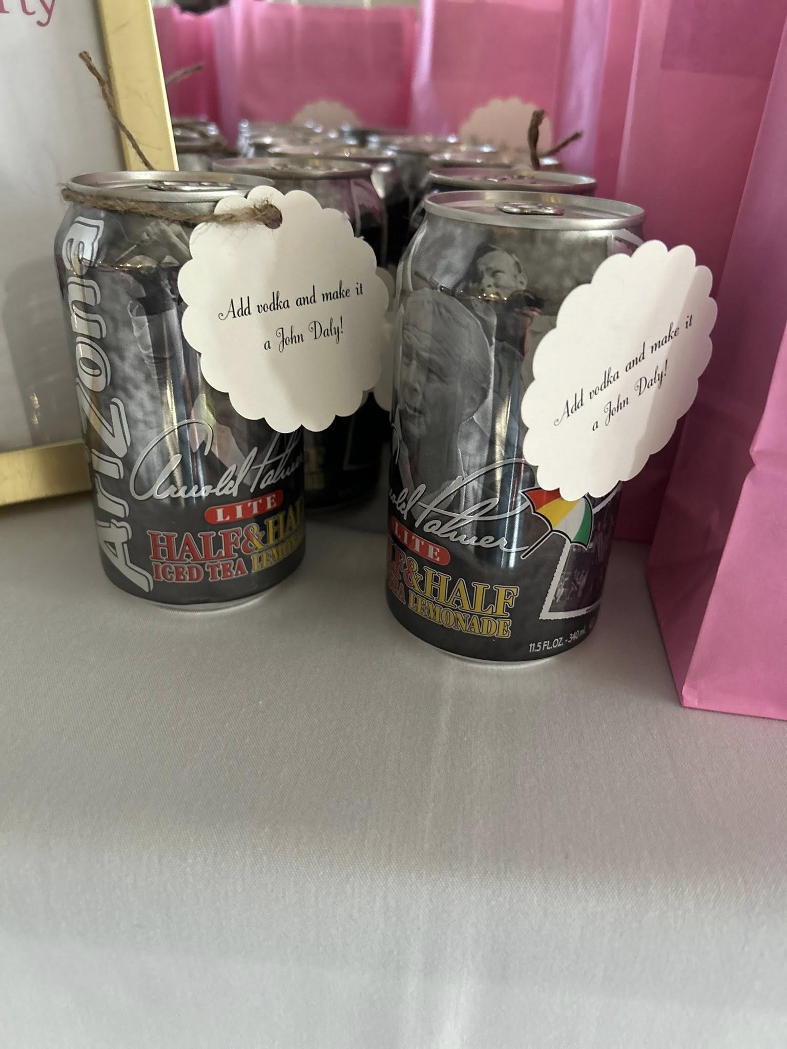 Arizona Arnold Palmer Lite cans with gift tags that say Add vodka and make it a John Daly