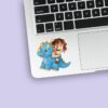 Custom Rider on a Blue Horned Dinosaur Face Cutout – Sticker Custom Rider on a Blue Horned Dinosaur Face Cutout shown on a sticker mockup