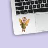 Custom Garden Fairy with Golden Wings Face Cutout – Sticker Custom Garden Fairy with Golden Wings Face Cutout shown on a sticker mockup