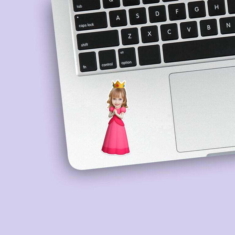 Custom Pink-Gowned Game Princess Face Cutout – Sticker Custom Pink-Gowned Game Princess Face Cutout shown on a sticker mockup
