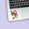 Custom Pixel-Style Pink Adventurer with Sword Face Cutout – Sticker Custom Pixel-Style Pink Adventurer with Sword Face Cutout shown on a sticker mockup