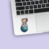 Custom Astronaut Seated on a Small Planet Face Cutout – Sticker Custom Astronaut Seated on a Small Planet Face Cutout shown on a sticker mockup