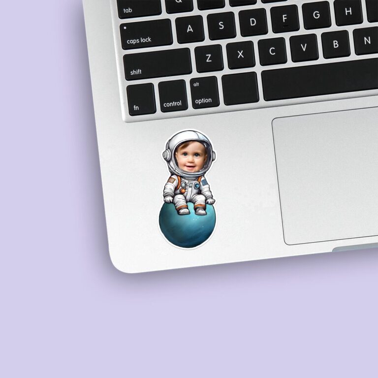 Custom Astronaut Seated on a Small Planet Face Cutout – Sticker Custom Astronaut Seated on a Small Planet Face Cutout shown on a sticker mockup