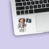 Custom Astronaut Holding a Number 1 Flag Face Cutout – Sticker Custom Astronaut Holding a Number 1 Flag Face Cutout shown on a sticker mockup