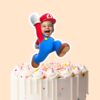 Custom Red-Capped Game Hero Jumping Face Cutout – Cake Topper Custom Red-Capped Game Hero Jumping Face Cutout shown on a cake topper mockup