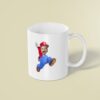 Custom Red-Capped Game Hero Jumping Face Cutout – Mug Custom Red-Capped Game Hero Jumping Face Cutout shown on a mug mockup