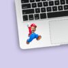 Custom Red-Capped Game Hero Jumping Face Cutout – Sticker Custom Red-Capped Game Hero Jumping Face Cutout shown on a sticker mockup