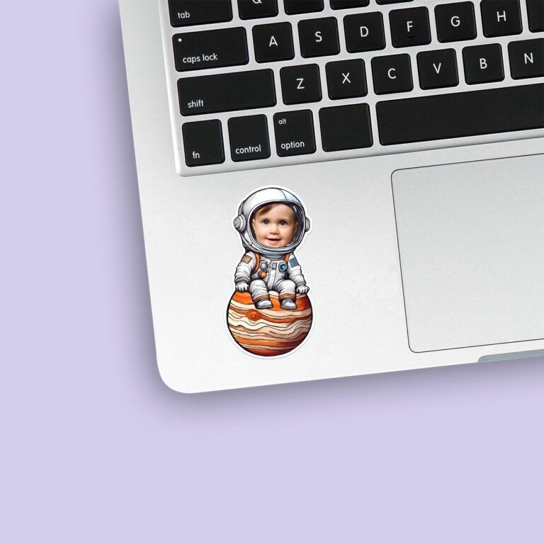 Custom Astronaut Seated on Jupiter Face Cutout – Sticker Custom Astronaut Seated on Jupiter Face Cutout shown on a sticker mockup