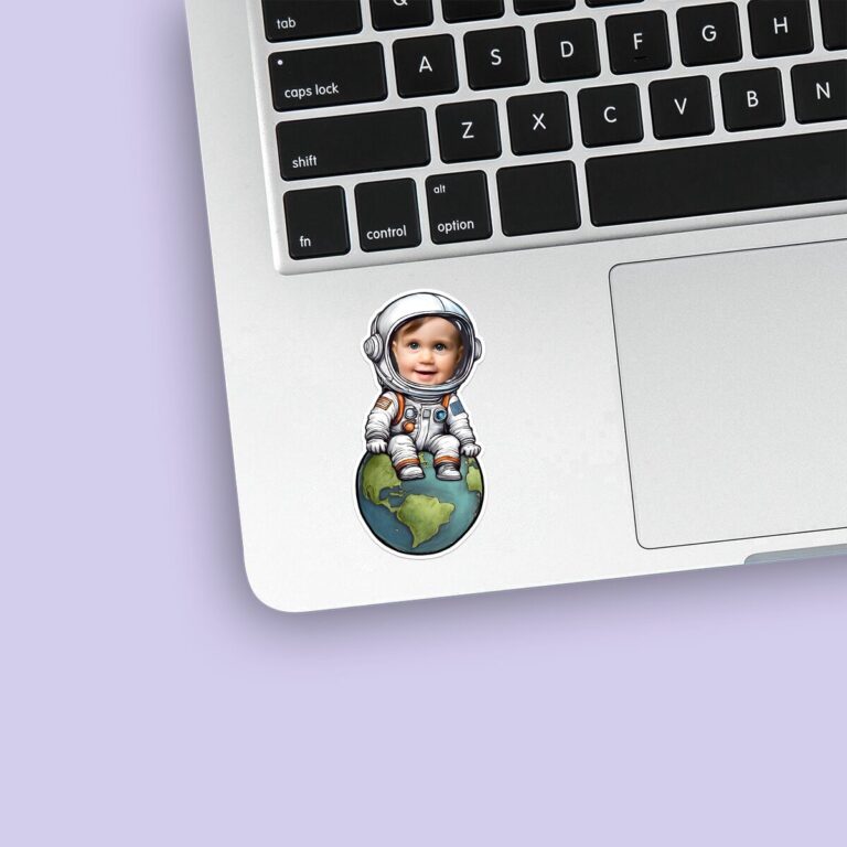 Custom Astronaut Seated on Earth Face Cutout – Sticker Custom Astronaut Seated on Earth Face Cutout shown on a sticker mockup