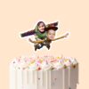 Custom Flying Cowboy and Space-Ranger Duo Face Cutout – Cake Topper Custom Flying Cowboy and Space-Ranger Duo Face Cutout shown on a cake topper mockup
