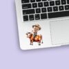 Custom Farmer Riding a Brown-And-White Cow Face Cutout – Sticker Custom Farmer Riding a Brown-And-White Cow Face Cutout shown on a sticker mockup