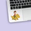 Custom Child Riding a Yellow-Green Triceratops Face Cutout – Sticker Custom Child Riding a Yellow-Green Triceratops Face Cutout shown on a sticker mockup