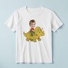Custom Child Riding a Yellow-Green Triceratops Face Cutout – T-shirt Custom Child Riding a Yellow-Green Triceratops Face Cutout shown on a T-shirt mockup