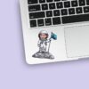 Custom Astronaut Planting a Space Flag Face Cutout – Sticker Custom Astronaut Planting a Space Flag Face Cutout shown on a sticker mockup
