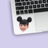 Custom Black Round-Ear Cap Portrait Face Cutout – Sticker Custom Black Round-Ear Cap Portrait Face Cutout shown on a sticker mockup