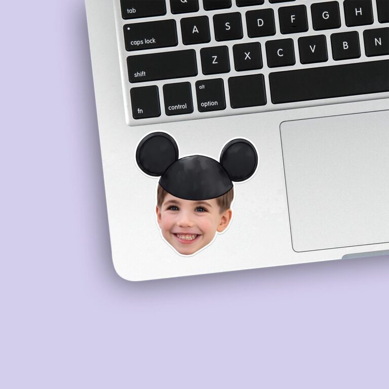 Custom Black Round-Ear Cap Portrait Face Cutout – Sticker Custom Black Round-Ear Cap Portrait Face Cutout shown on a sticker mockup