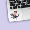 Custom Child Riding a Blue Raptor Face Cutout – Sticker Custom Child Riding a Blue Raptor Face Cutout shown on a sticker mockup