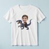 Custom Child Riding a Blue Raptor Face Cutout – T-shirt Custom Child Riding a Blue Raptor Face Cutout shown on a T-shirt mockup