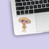 Custom Gold Embroidered Charro Outfit Face Cutout – Sticker Custom Gold Embroidered Charro Outfit Face Cutout shown on a sticker mockup