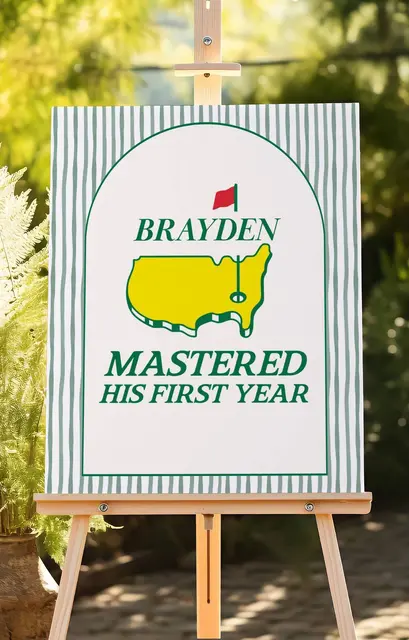 Mastered First Year Sign with Green Stripes on a Wooden Easel