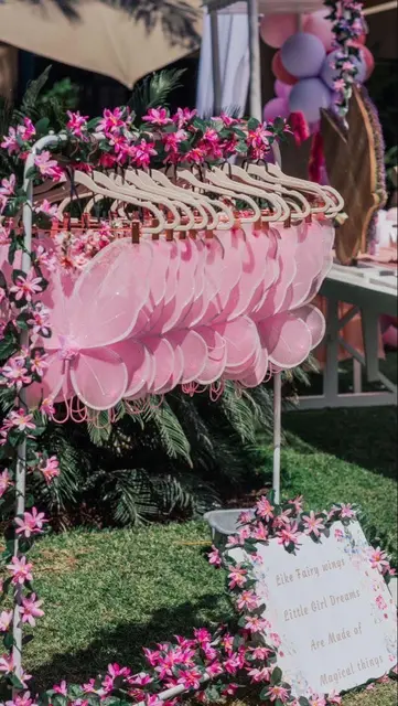 Pink Fairy Wing Display Rack with Floral Garlands