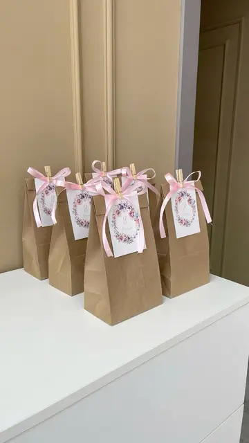 Kraft Gift Bags with Floral Tags and Pink Ribbon Bows