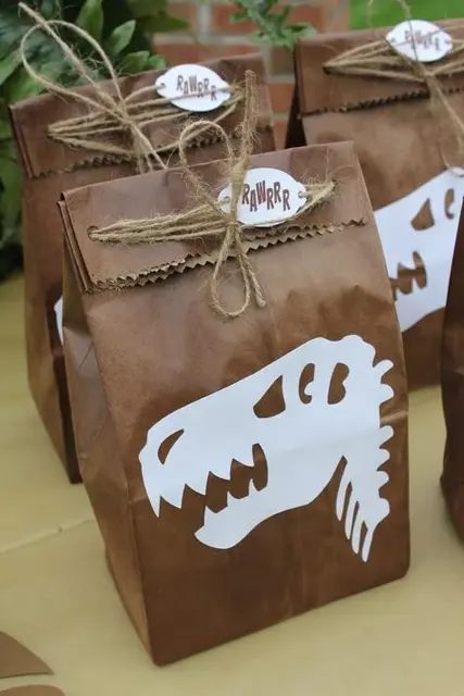 Dinosaur Skull Cutouts on Kraft Favor Bags