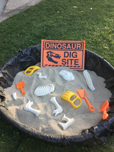 Dinosaur Dig Pit with an Orange Excavation Sign