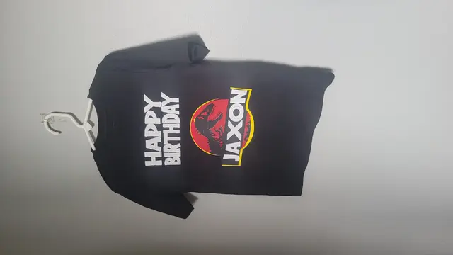 Black Dinosaur Birthday Shirt with a Name Emblem