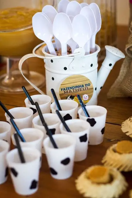 Cow-Print Cups with a Watering Can Spoon Holder