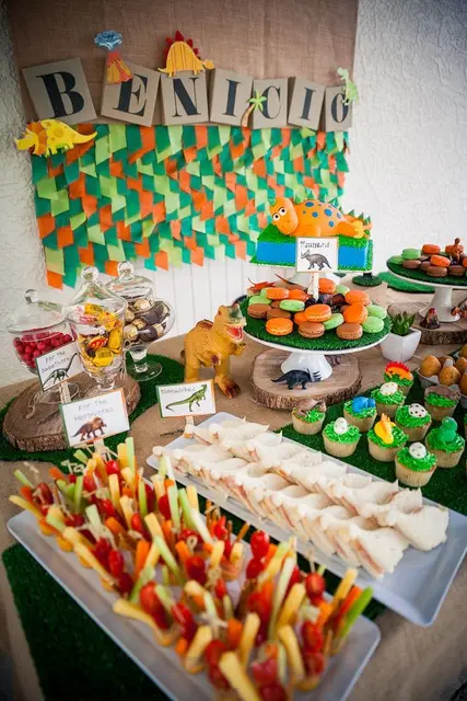 Dinosaur Buffet with a Green and Orange Backdrop