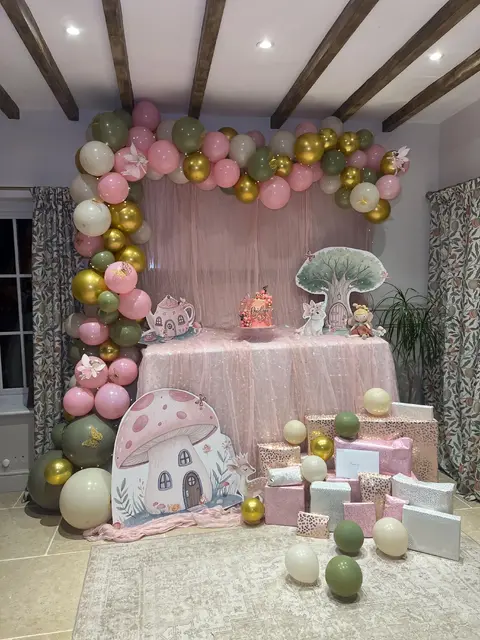 Fairy Cake Table with Pink, Green, and Gold Balloons