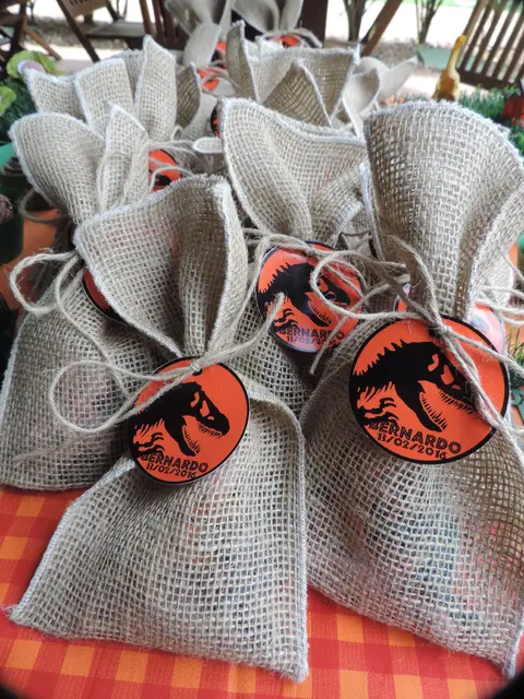 Dinosaur Favor Bags with Orange Tags and Twine Bows