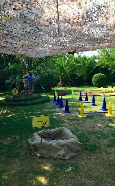 Dinosaur Garden Obstacle Course with a Dig Pit