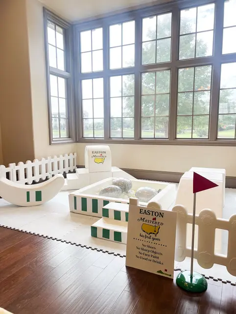 Golf Birthday Play Area with Green Stripes and a Rules Sign