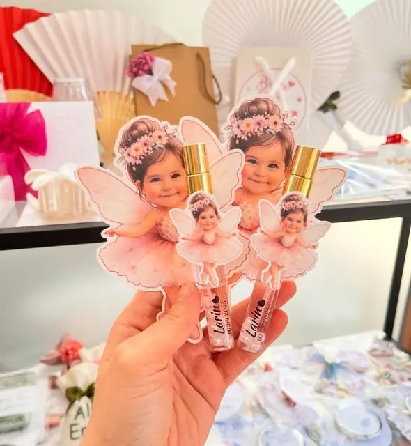 Fairy Photo Cutouts on Gold-Capped Favor Bottles